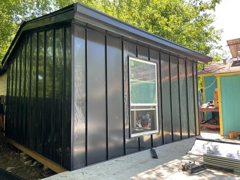 Black standing seam metal wall panels for Metal Roof Installation in Woonsocket