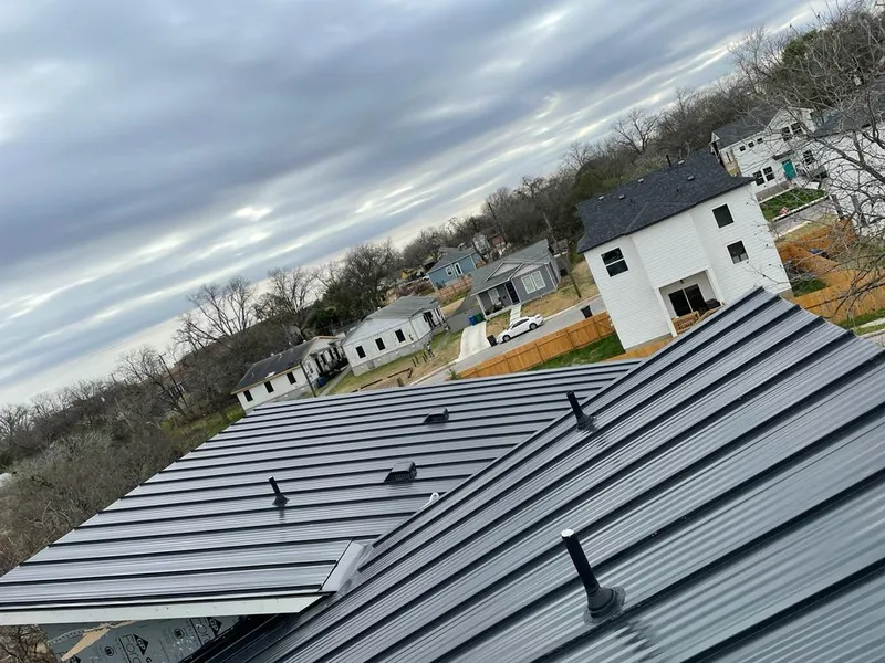 Standing seam metal roof panels with vents for Skylight Repair in Woonsocket